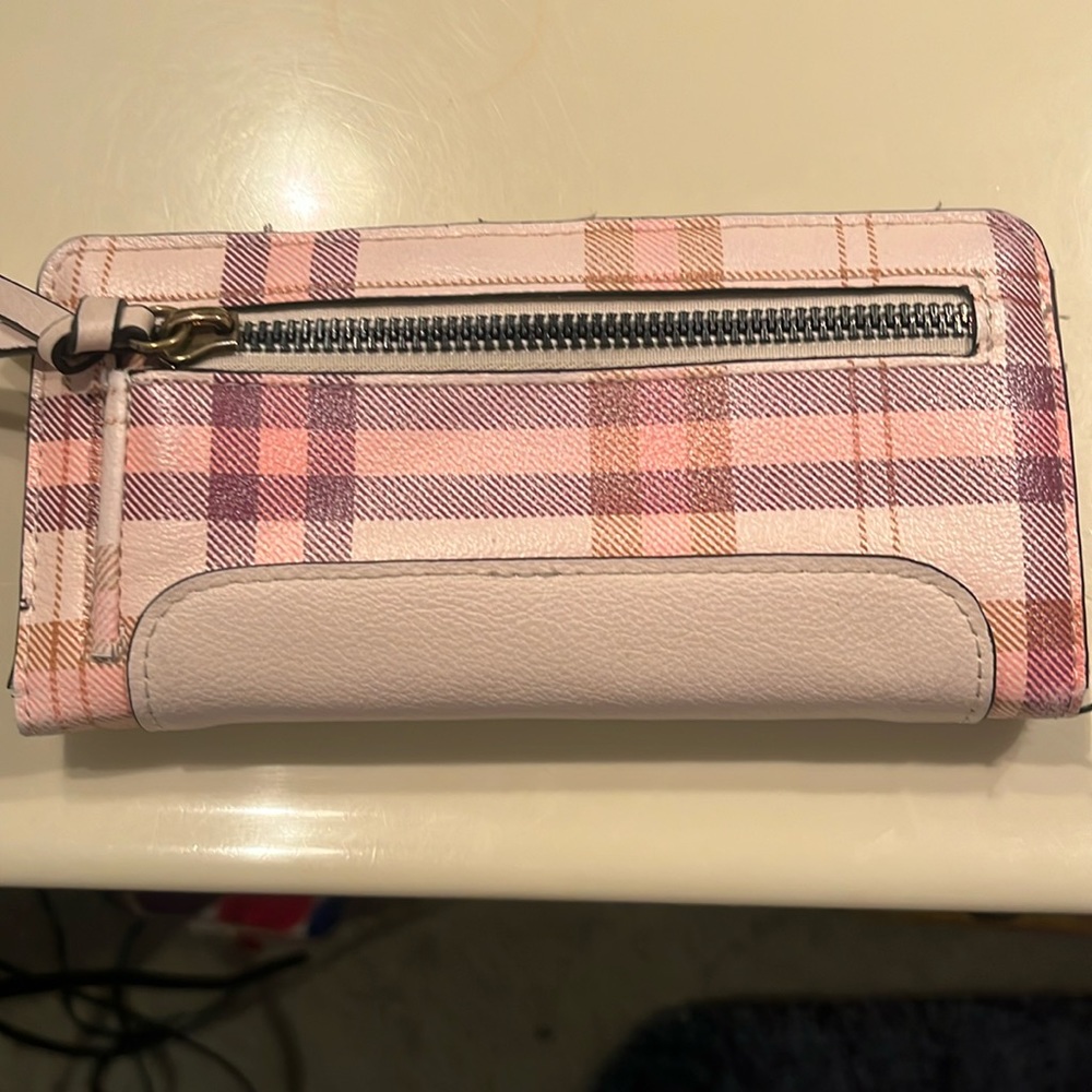 Wallet with 12 credit card slots and zipper close coin holder